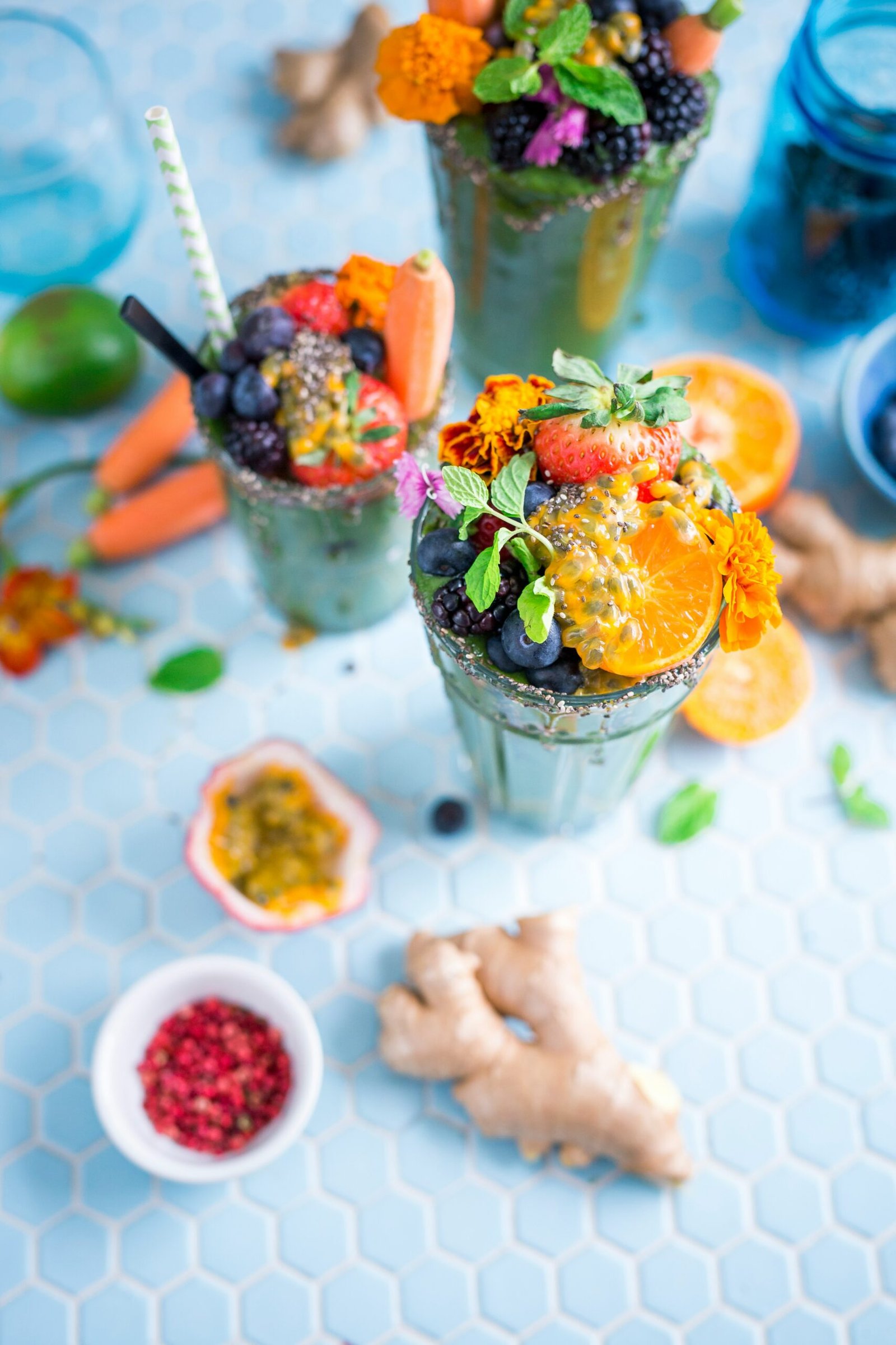 tilt shift lens photography of fruits in drinking glass